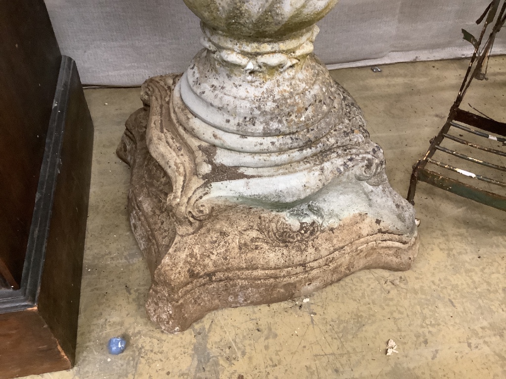 A reconstituted stone garden bird bath, diameter 42cm, height 80cm
